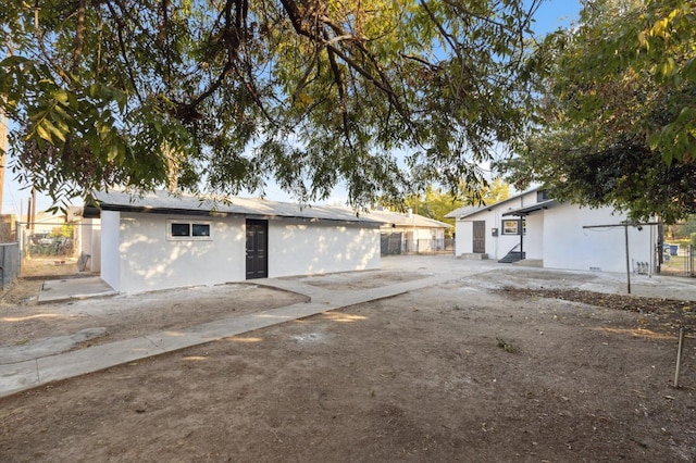 ranch-style house with a patio