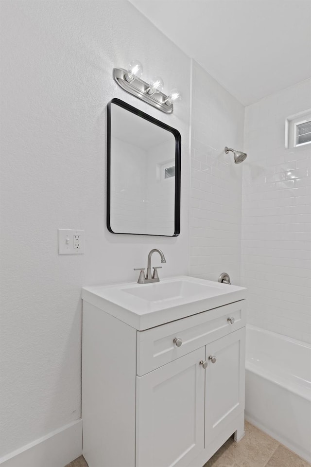 bathroom featuring tile patterned floors, vanity, and shower / washtub combination