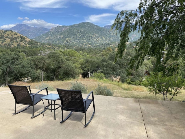 view of patio featuring a mountain view