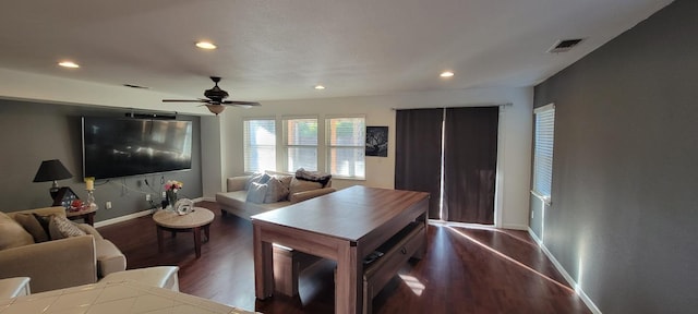 interior space featuring hardwood / wood-style floors and ceiling fan