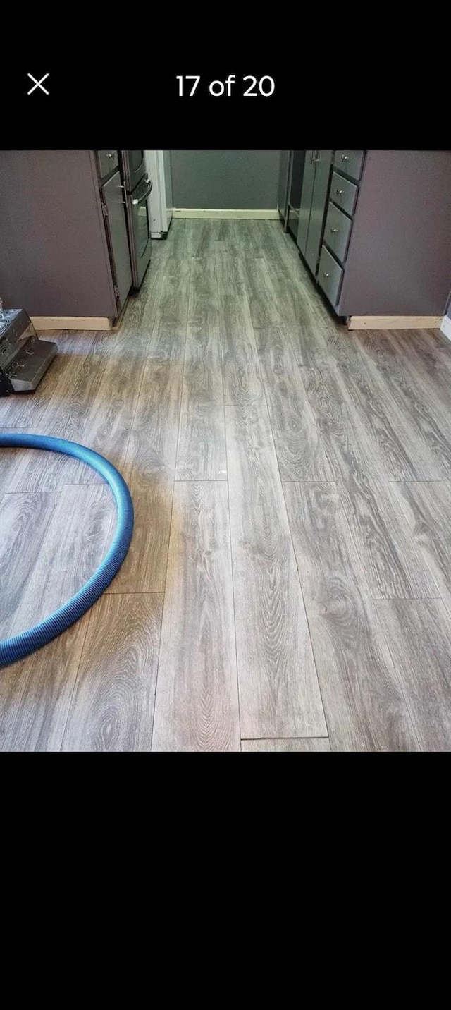 interior details featuring wood-type flooring