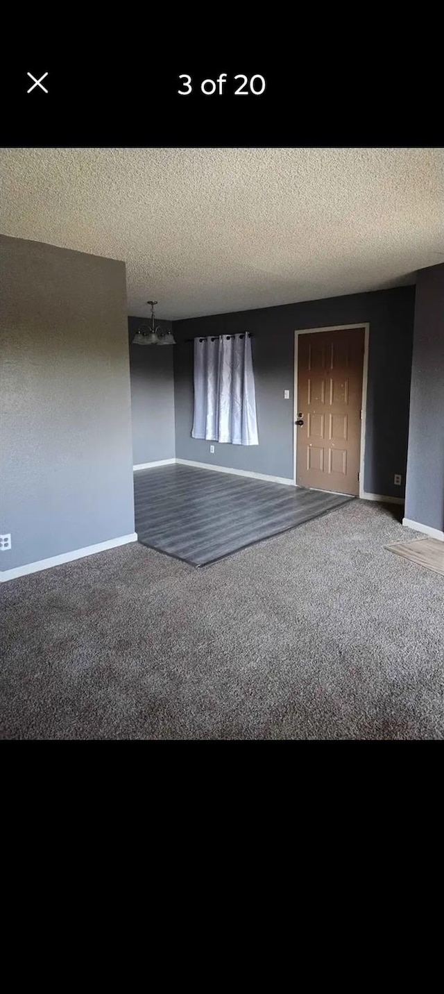 interior space with a textured ceiling