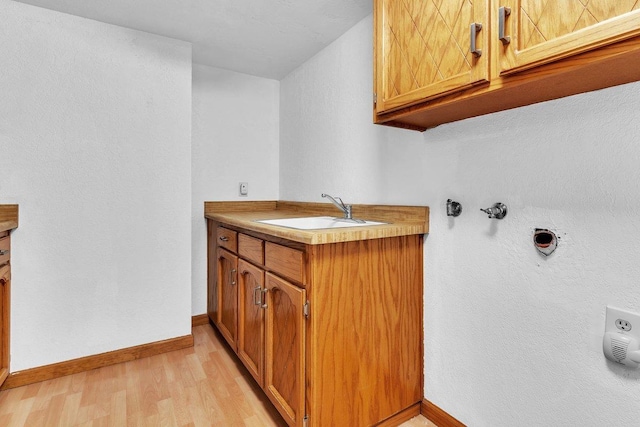 bathroom featuring vanity and hardwood / wood-style flooring