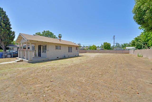339 N Delno Ave, Fresno, CA 93706 - rear view of property featuring a fenced backyard and crawl space