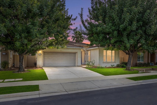 view of front of home with a lawn