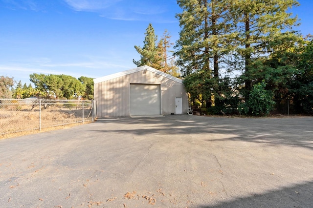 view of outbuilding with a garage