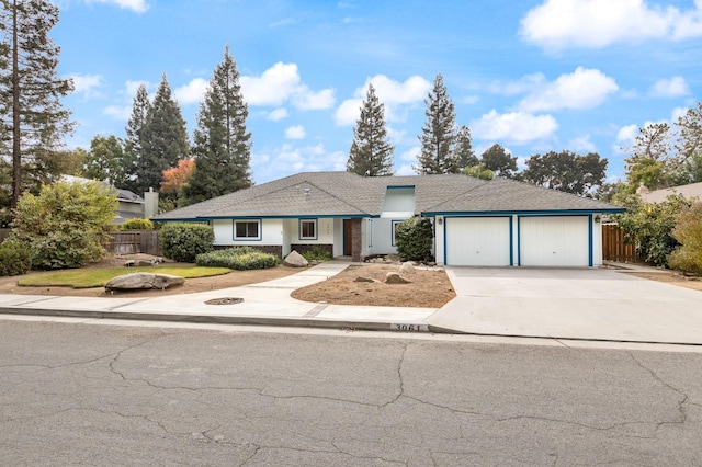 single story home with a garage