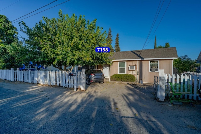 view of front of home with fence