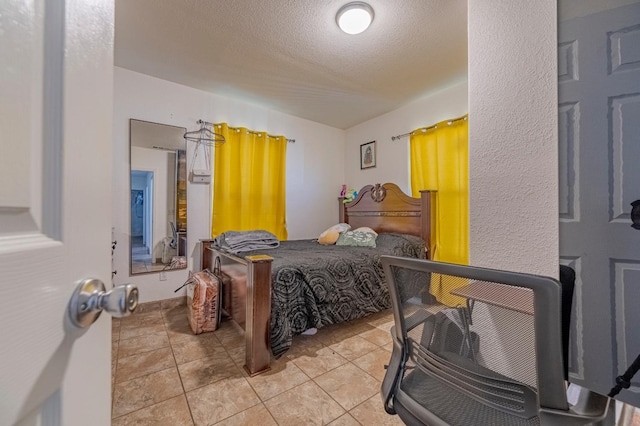 bedroom with a textured ceiling