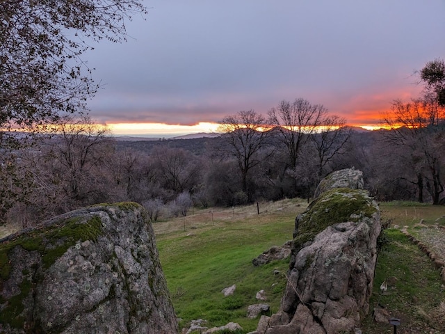 property view of mountains featuring a wooded view