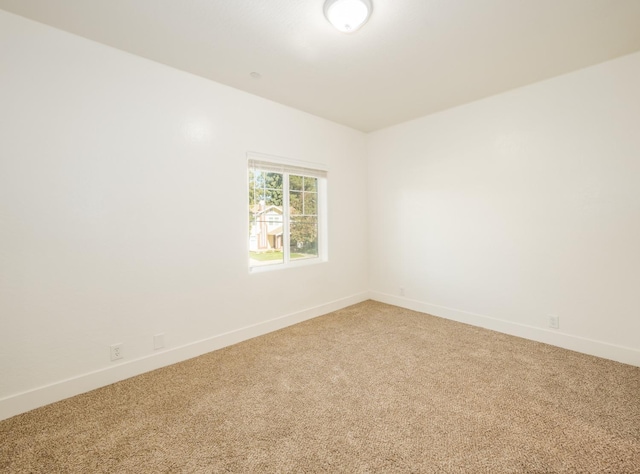 empty room featuring carpet flooring