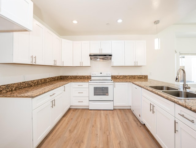 kitchen with hanging light fixtures, white appliances, white cabinetry, and sink