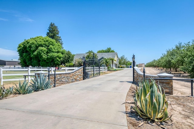 11333 E Church Ave, Sanger, CA 93657 - view of concrete surface featuring a gated entry and a gate