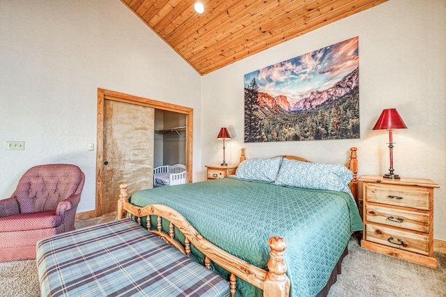 bedroom featuring carpet flooring, vaulted ceiling, wooden ceiling, and a closet