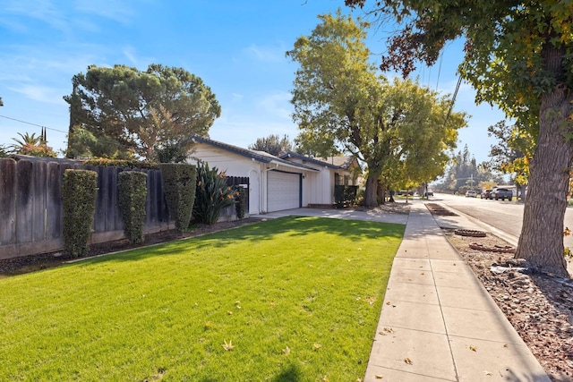 view of yard with a garage