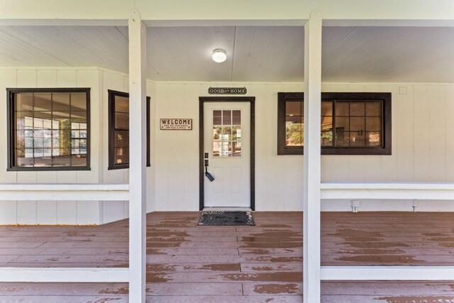 entrance to property with a porch