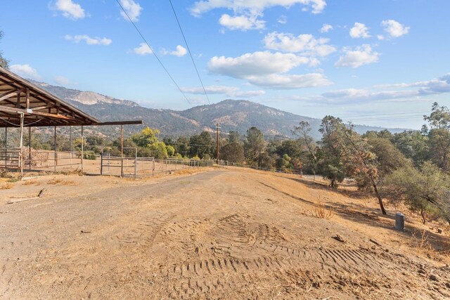 property view of mountains featuring a rural view