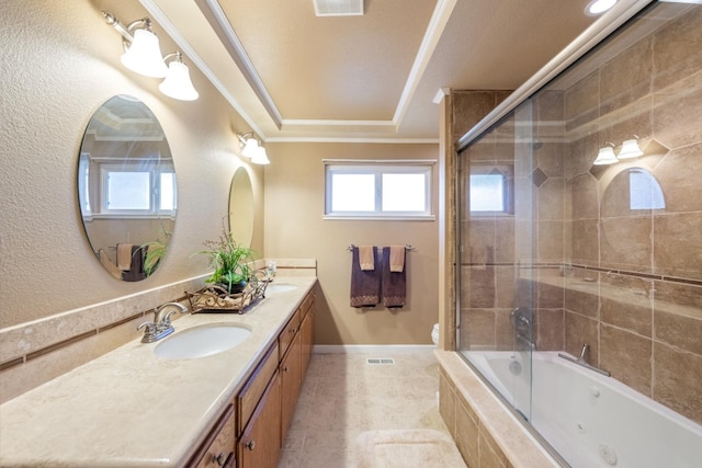 bathroom featuring tile patterned floors, vanity, bath / shower combo with glass door, and ornamental molding