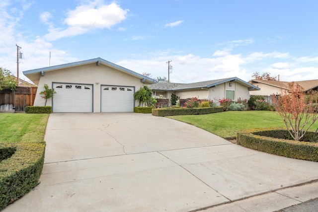 ranch-style house with a front yard and a garage