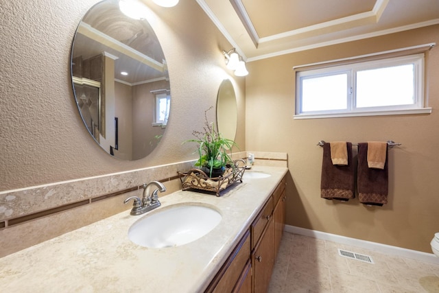 bathroom with tile patterned floors, vanity, toilet, and crown molding