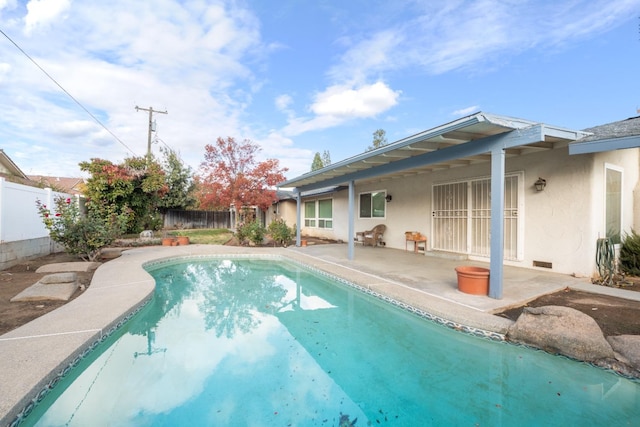 view of pool with a patio area