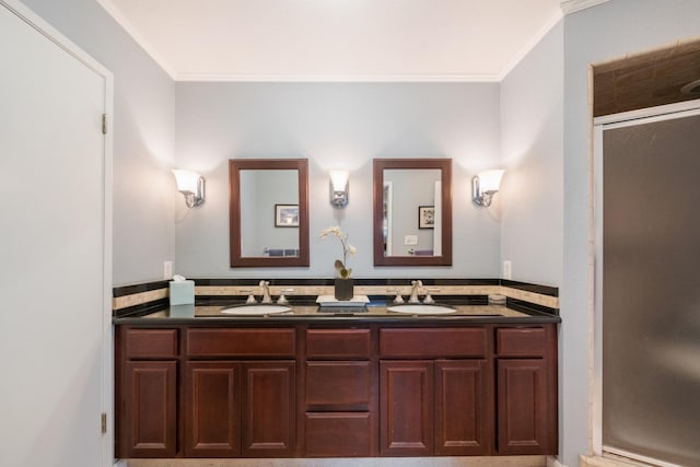 bathroom featuring vanity, an enclosed shower, and crown molding