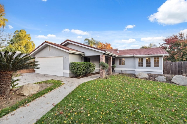 single story home with a garage and a front lawn