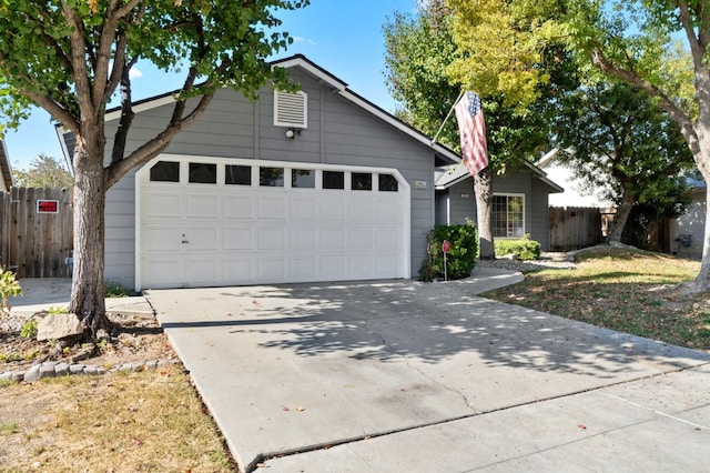 single story home with a garage