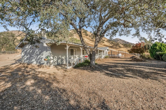 exterior space featuring a mountain view