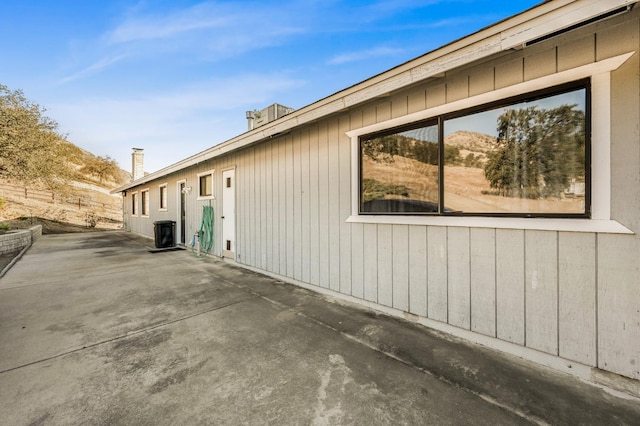 view of side of property featuring a patio