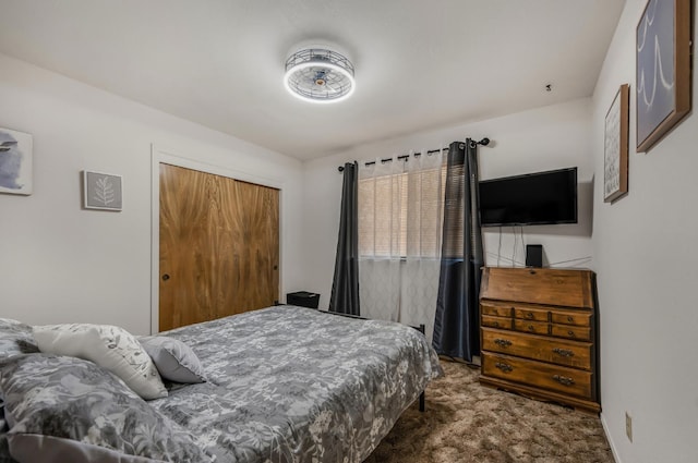 carpeted bedroom featuring a closet