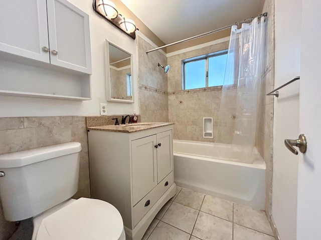 full bathroom with tile patterned flooring, vanity, shower / tub combo with curtain, and toilet