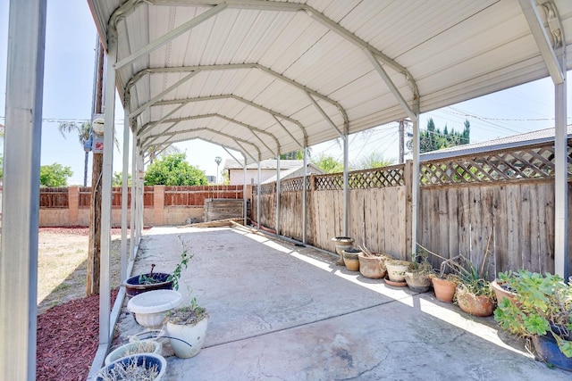 view of patio / terrace with a carport