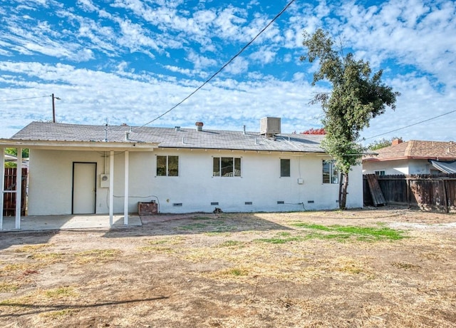 back of house featuring a patio and cooling unit