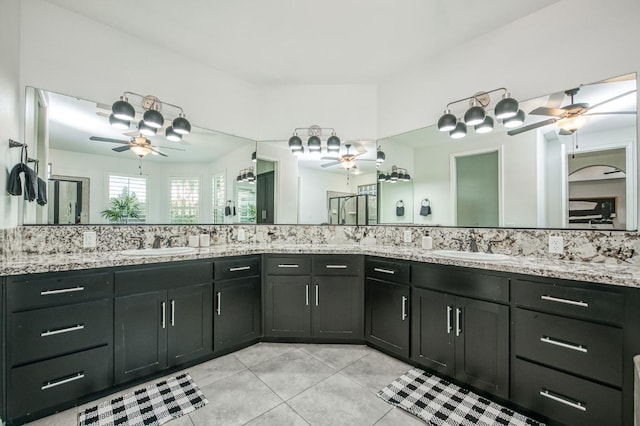 bathroom with tile patterned flooring and vanity