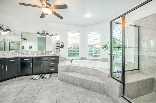 bathroom featuring tile patterned floors, ceiling fan, vanity, and shower with separate bathtub