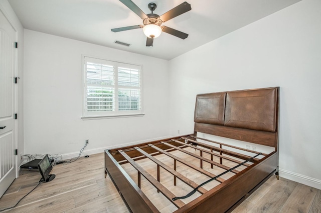 bedroom featuring ceiling fan and light hardwood / wood-style floors