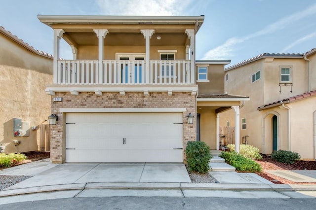 view of front of house with a balcony and a garage