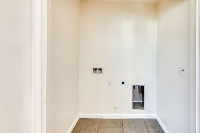 washroom featuring washer hookup, hookup for a gas dryer, light tile patterned floors, and electric dryer hookup