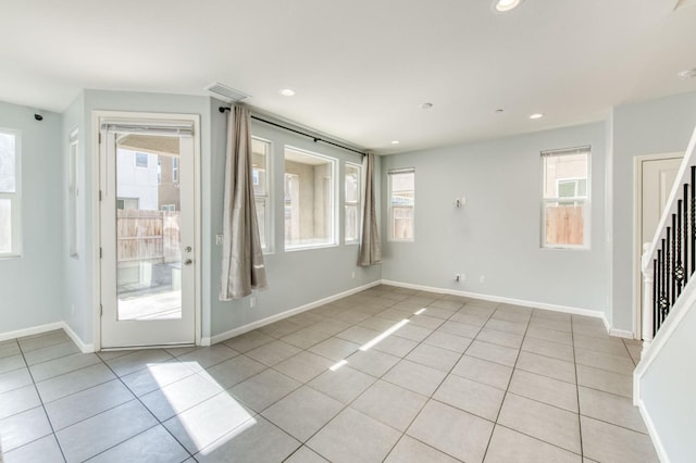 view of tiled spare room