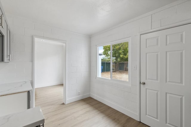 interior space with light hardwood / wood-style flooring