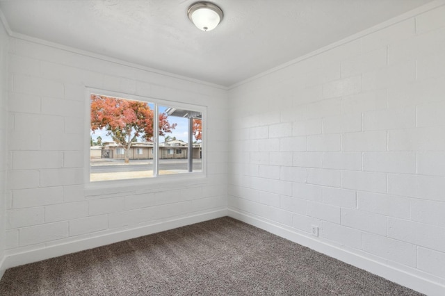 unfurnished room featuring carpet floors and ornamental molding