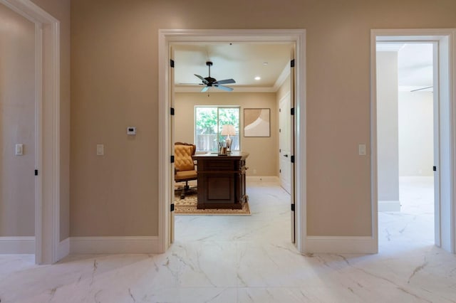 hall with crown molding, recessed lighting, baseboards, and marble finish floor