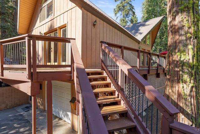 42270 Rockledge, Shaver Lake, CA 93664 - deck with stairway, a garage, and driveway