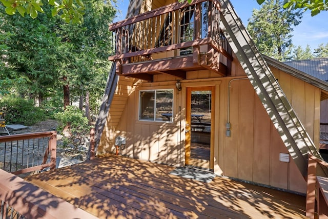 42270 Rockledge, Shaver Lake, CA 93664 - view of front of home with a wooden deck and a balcony