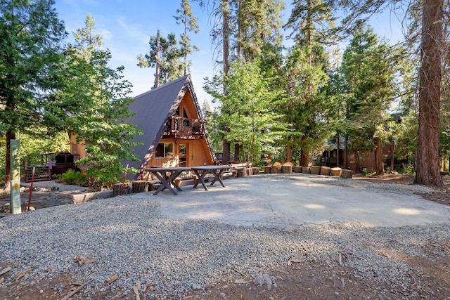 exterior space featuring a wooden deck