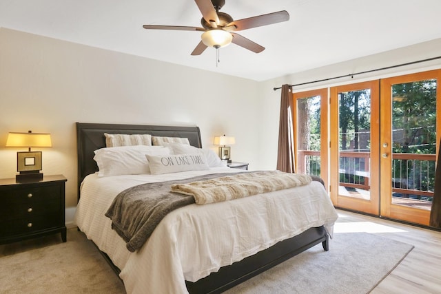 bedroom with ceiling fan, light hardwood / wood-style floors, access to exterior, and french doors