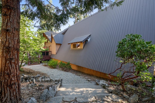 42270 Rockledge, Shaver Lake, CA 93664 - view of property exterior featuring a wooden deck and a metal roof