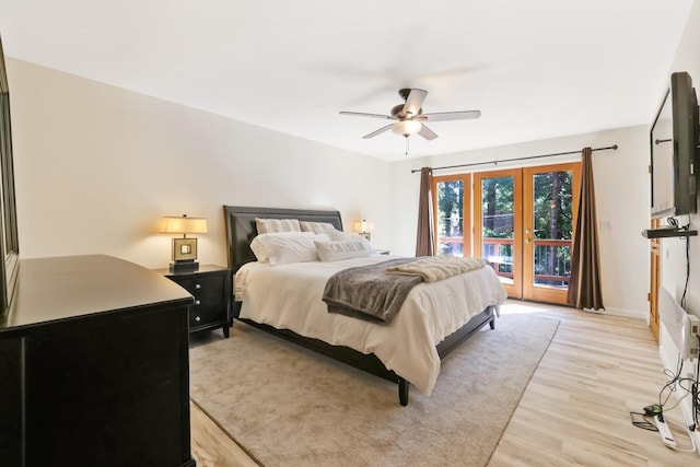 bedroom with access to outside, light hardwood / wood-style flooring, and ceiling fan