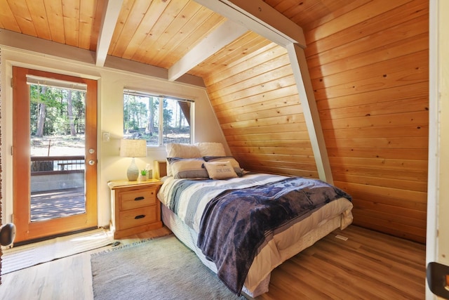 bedroom featuring access to exterior, wooden ceiling, vaulted ceiling with beams, wood walls, and wood-type flooring